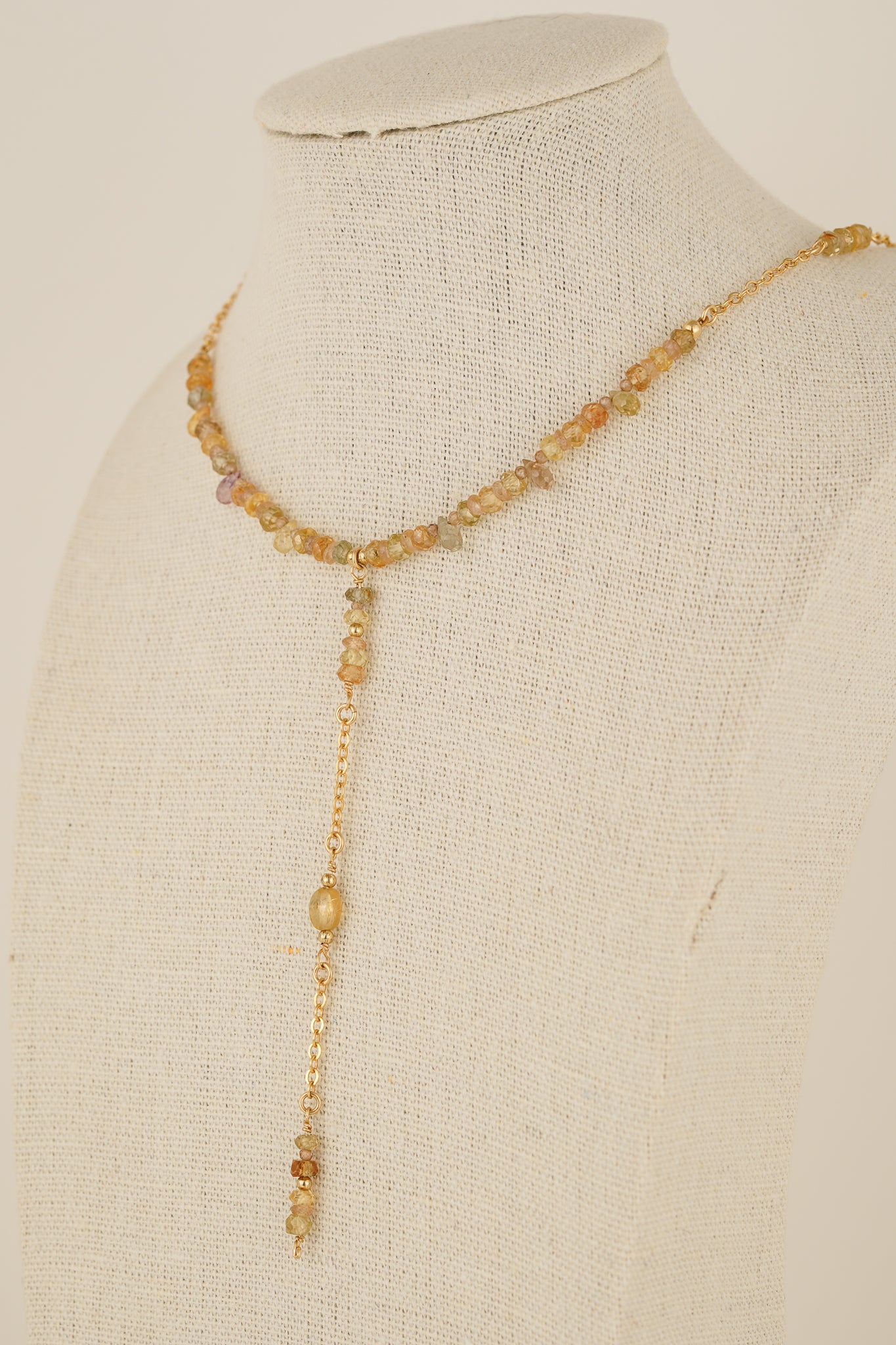 Mixed zircon lariat style necklace - gold