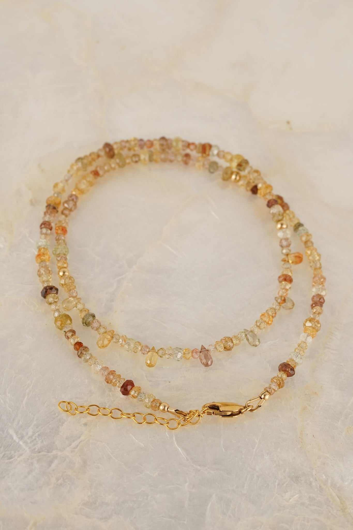 Mixed zircon beaded necklace with droplets - gold