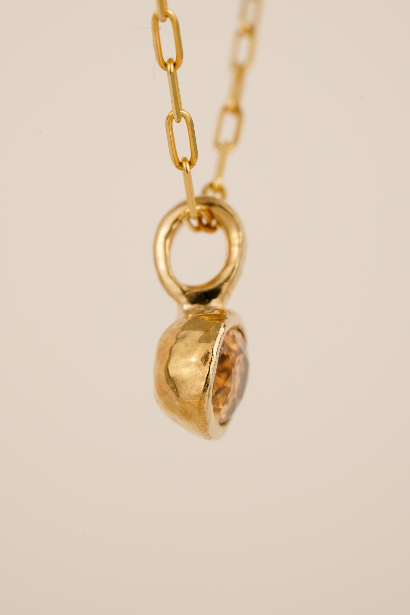 Solid gold whisky brown zircon pendant