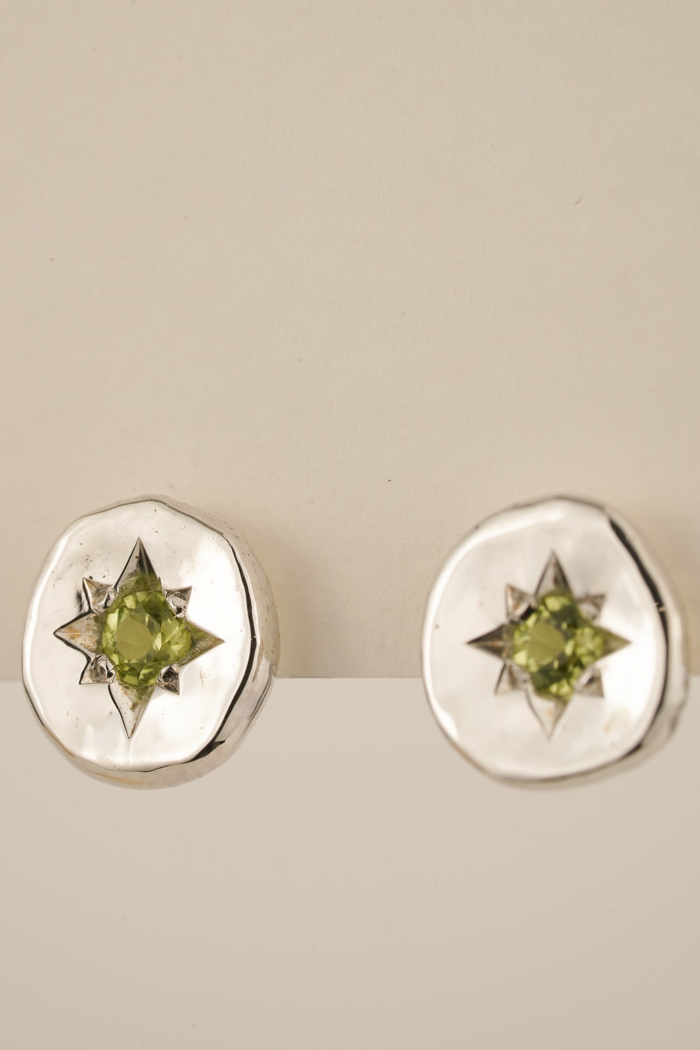 Molten peridot studs