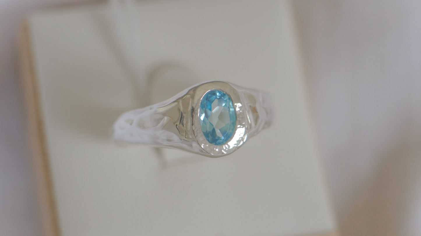 Oval blue topaz signet - silver