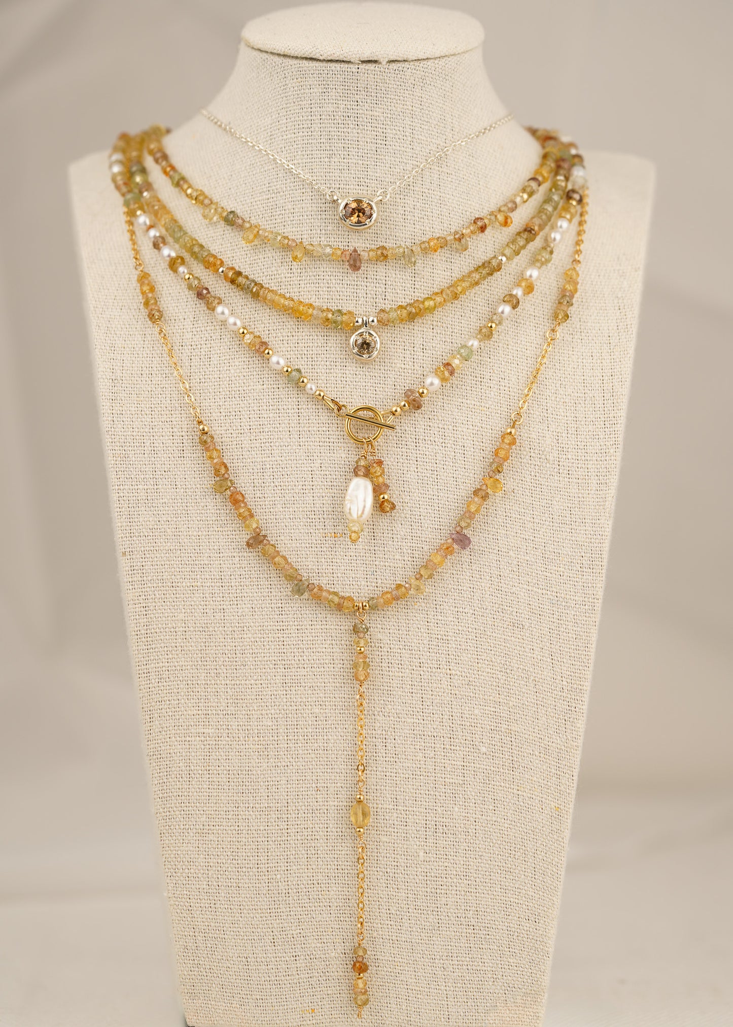 Mixed zircon beaded necklace with champagne zircon pendant - silver