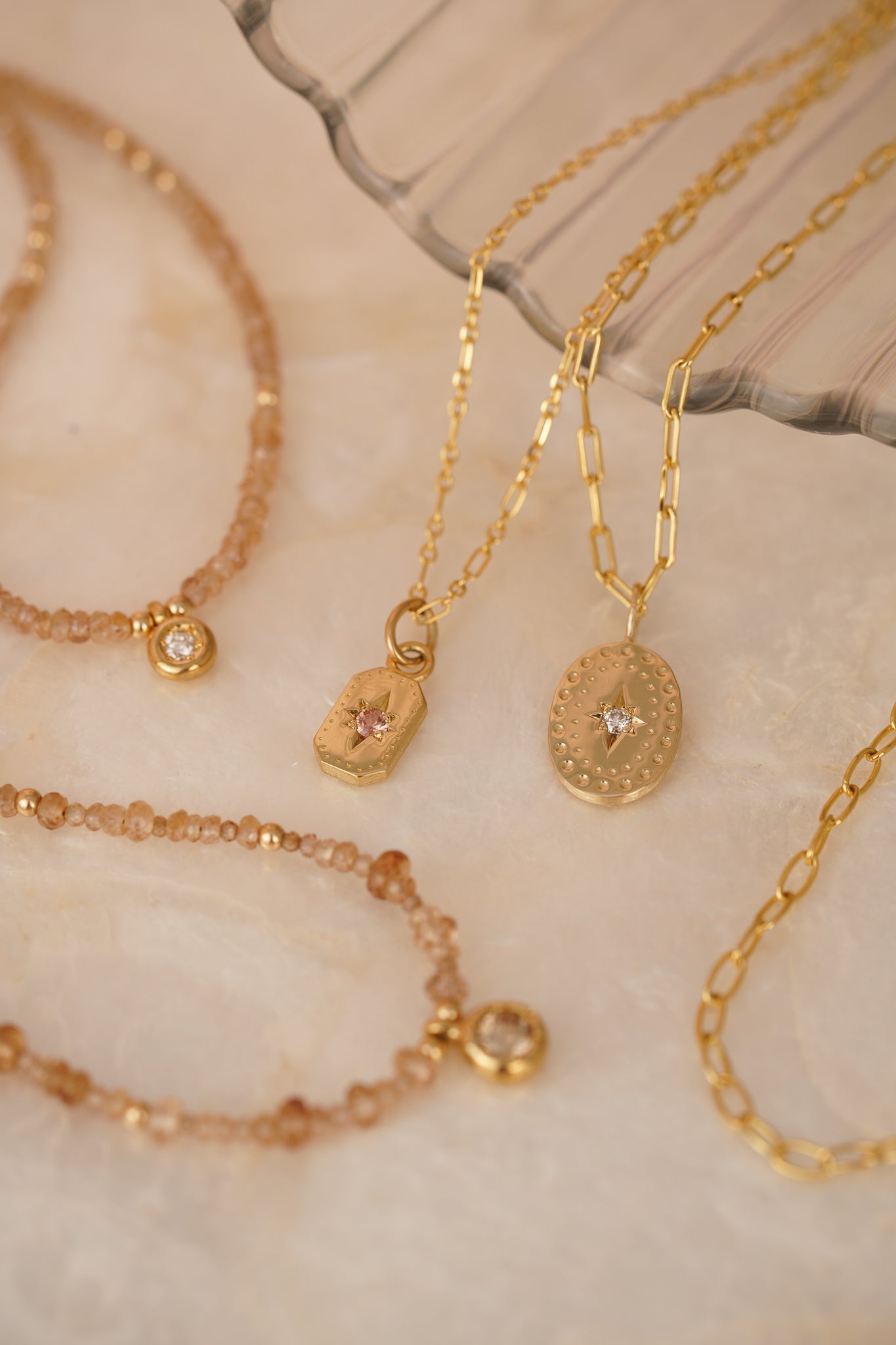 Solid gold large oval pendant with natural diamond