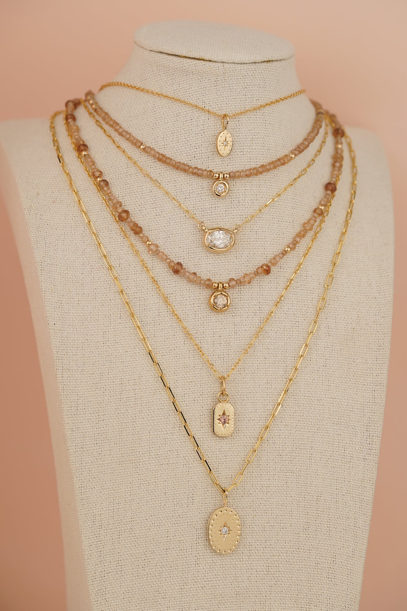 Solid gold large oval pendant with natural diamond