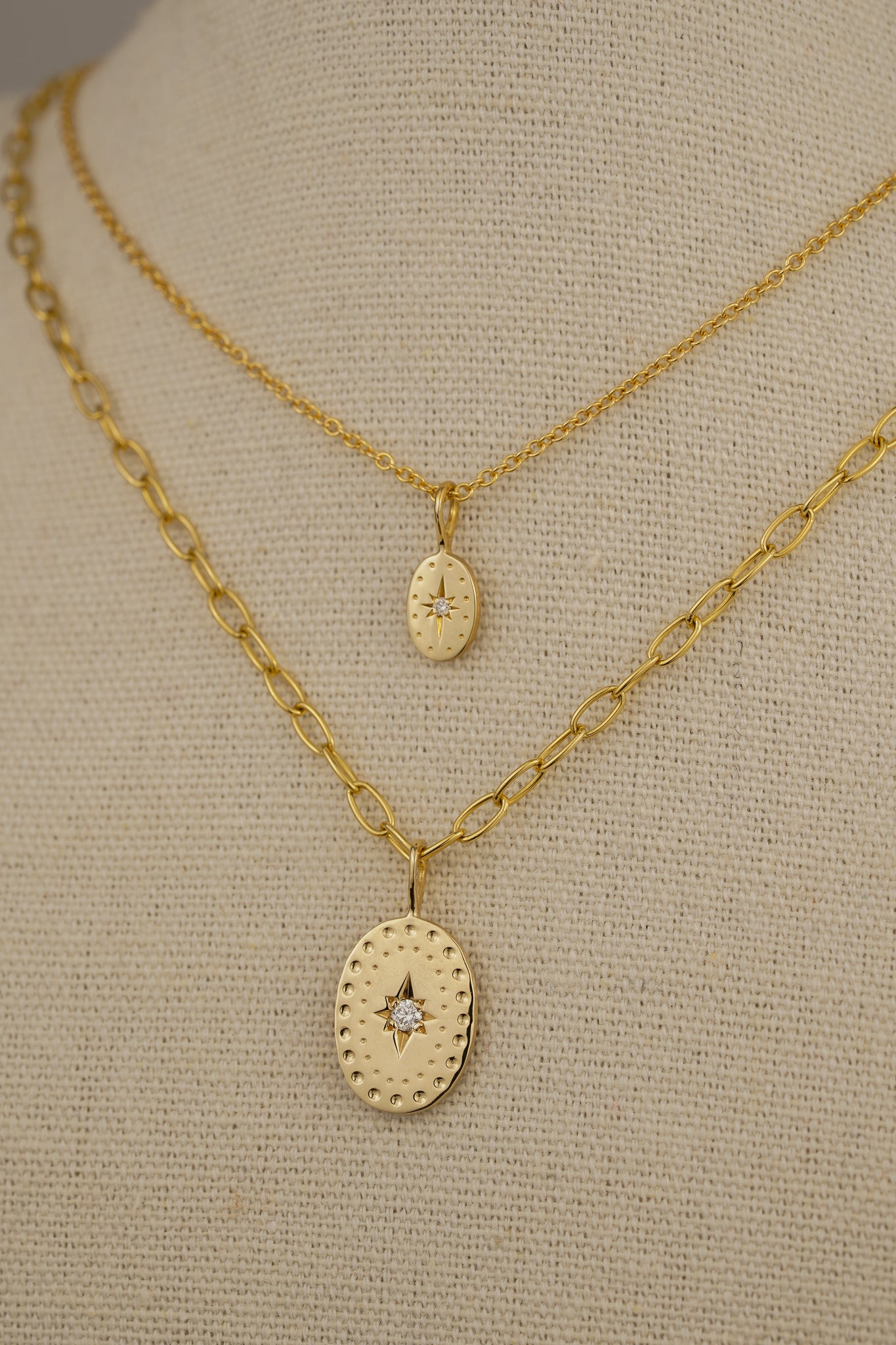 Solid gold large oval pendant with natural diamond