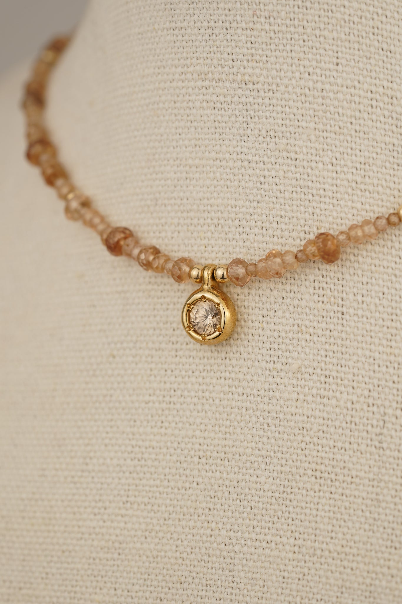 Solid gold mixed champagne zircon beaded necklace with pinkish-champagne zircon pendant