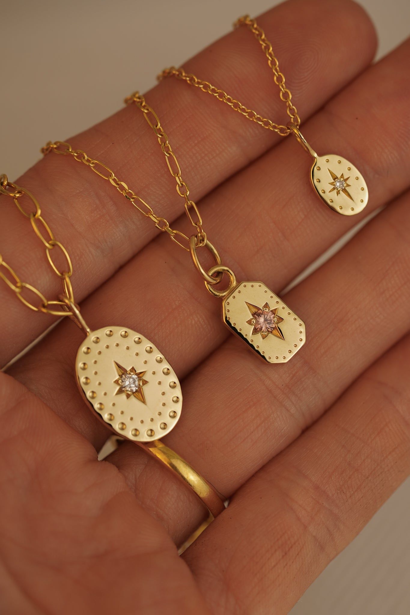 Solid gold large oval pendant with natural diamond