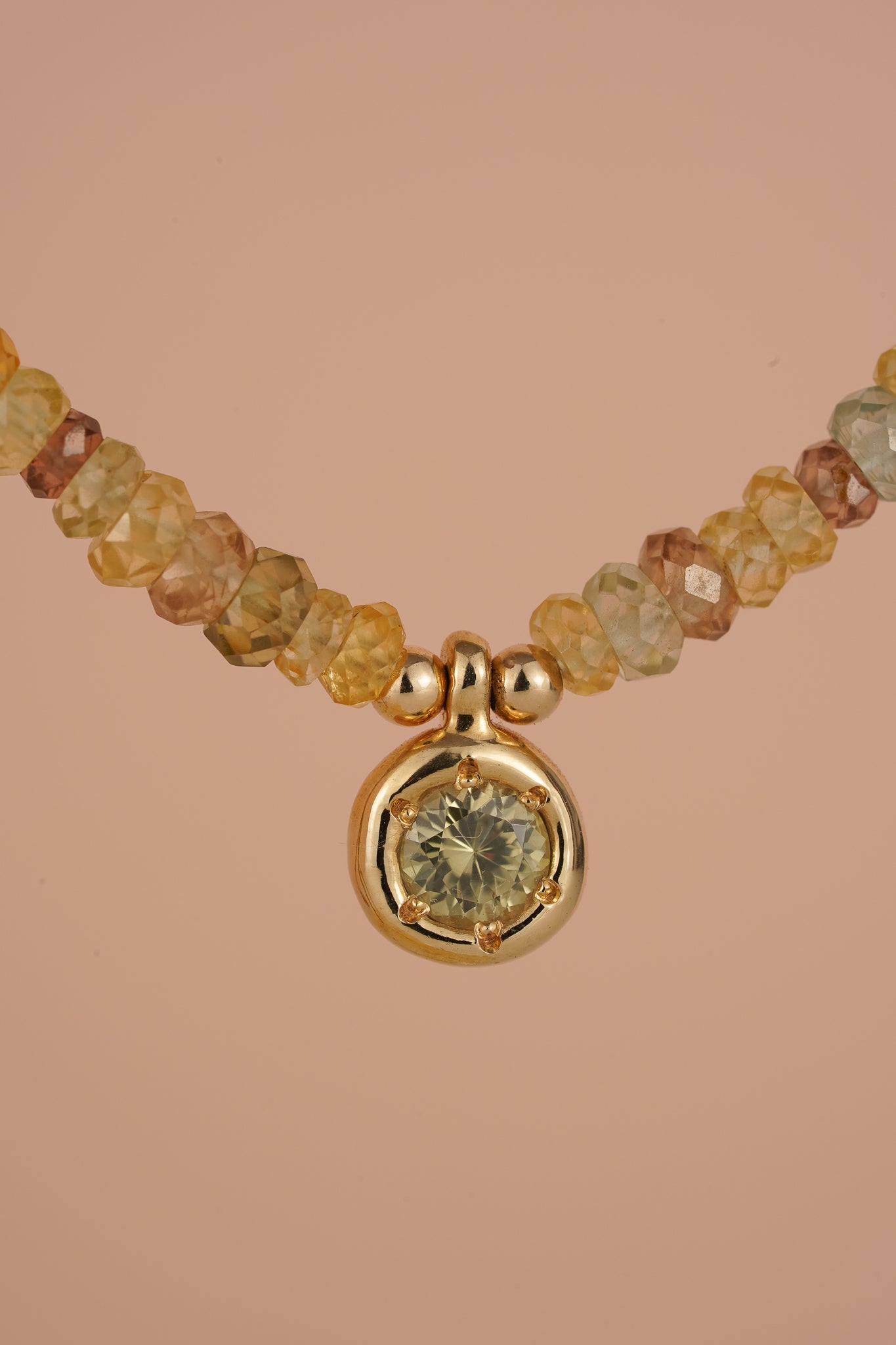 Solid gold mixed-colour zircon beaded necklace with green zircon pendant
