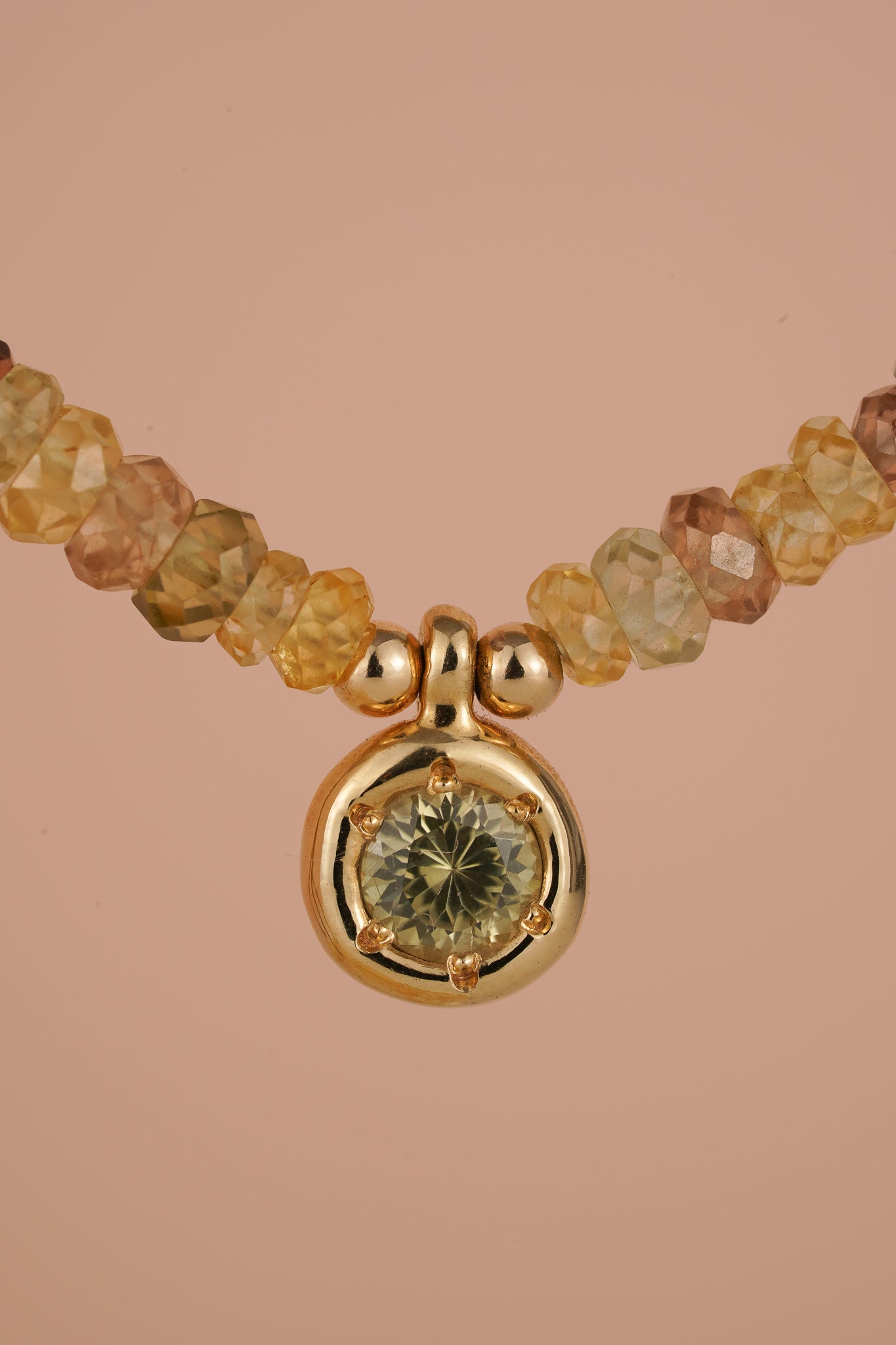 Solid gold mixed-colour zircon beaded necklace with green zircon pendant