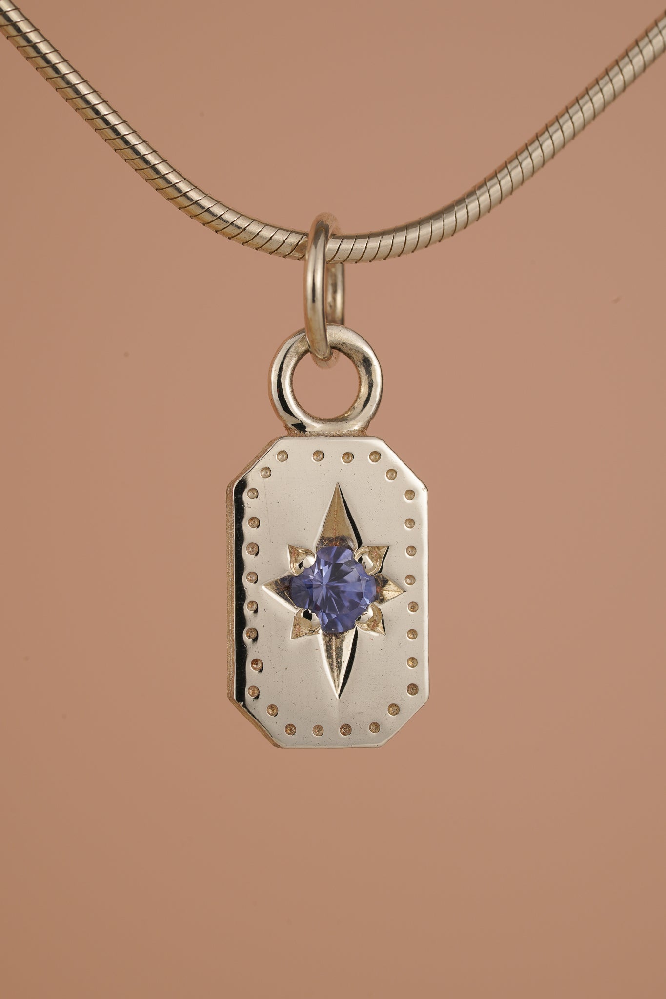 Emerald cut Ceylon sapphire pendant