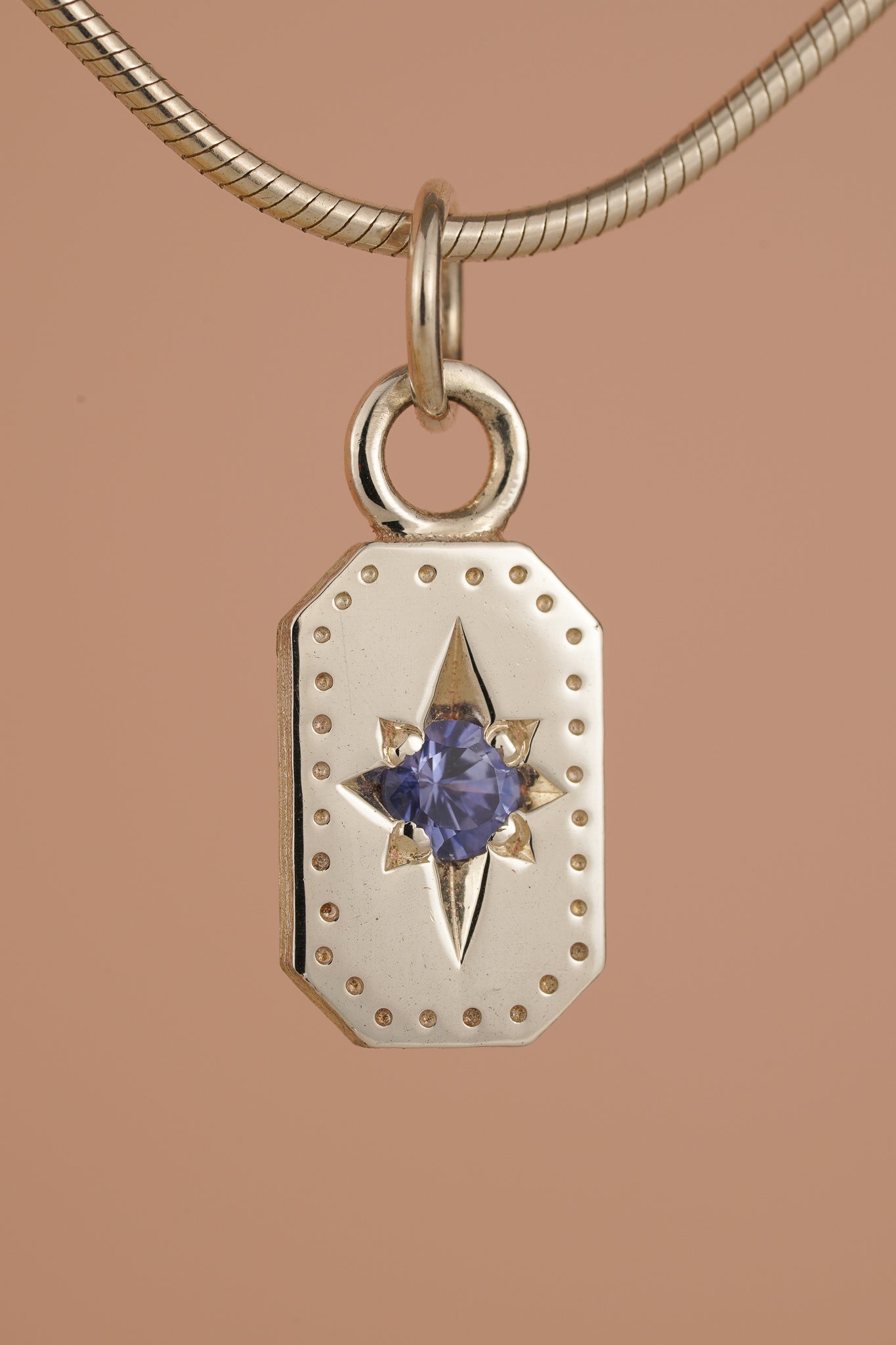 Emerald cut Ceylon sapphire pendant