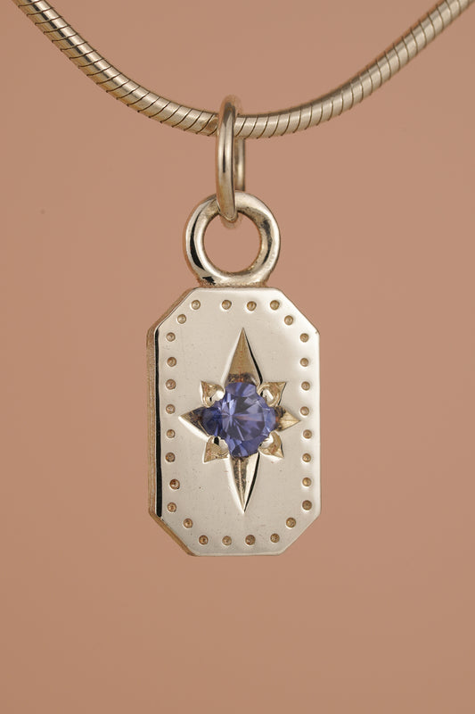 Emerald cut Ceylon sapphire pendant