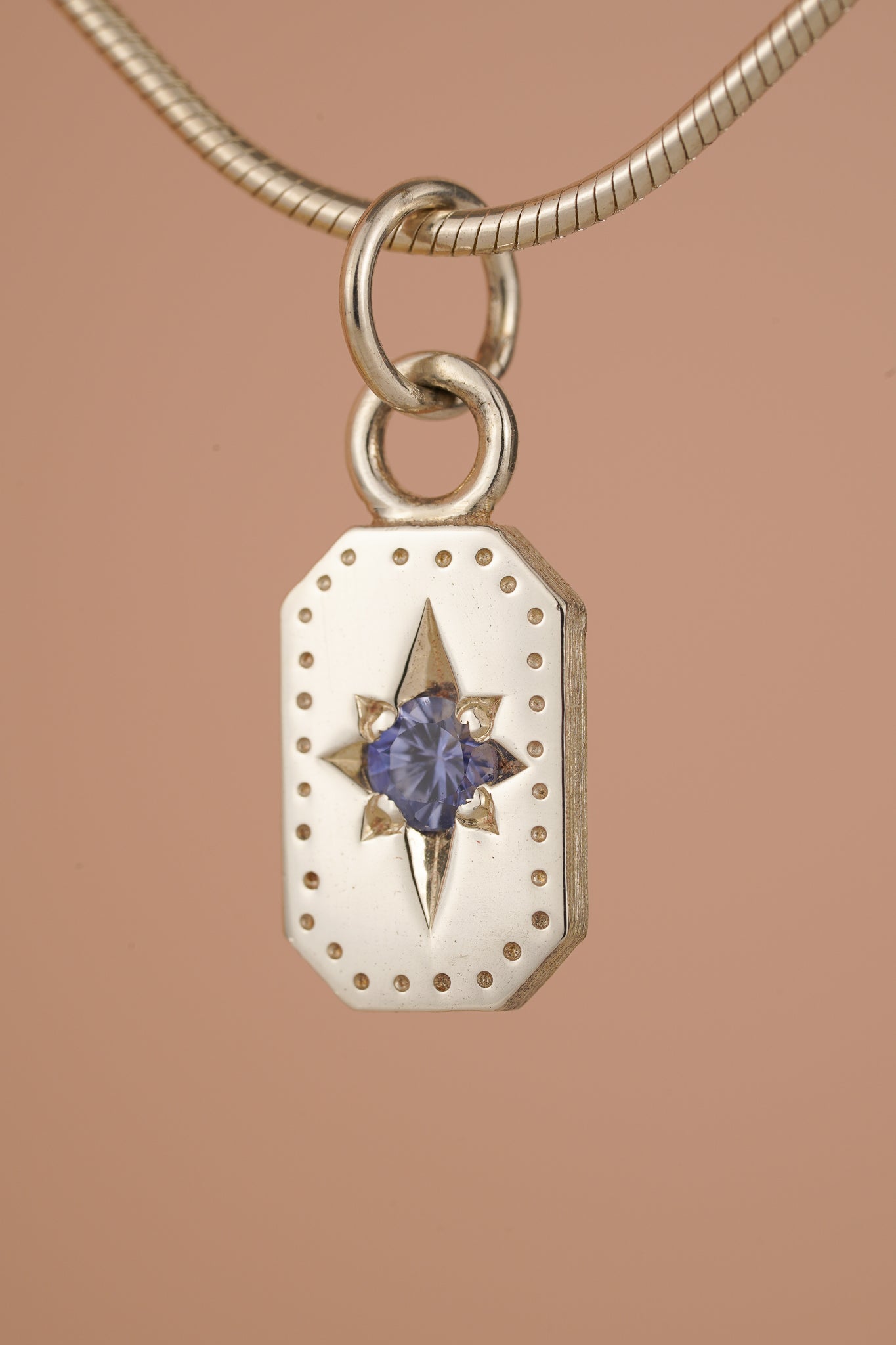 Emerald cut Ceylon sapphire pendant