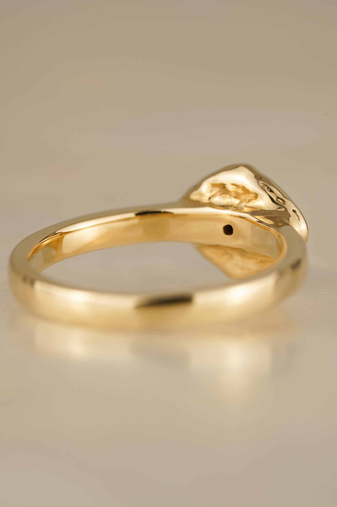 Solid gold blue-green boulder opal ring