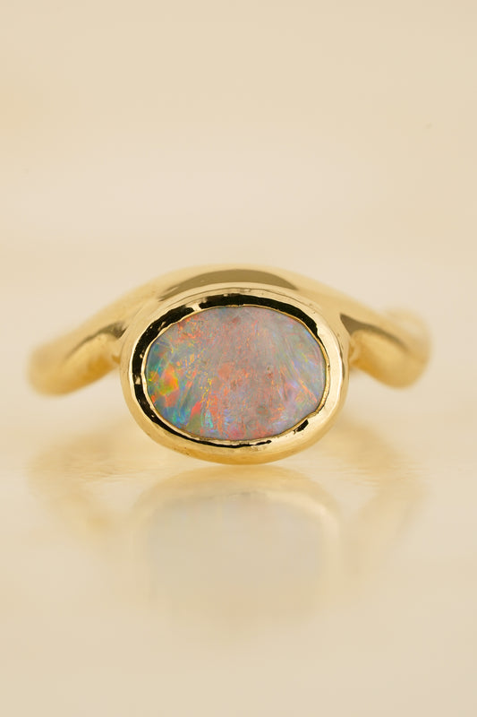 Solid gold pink opal wave ring