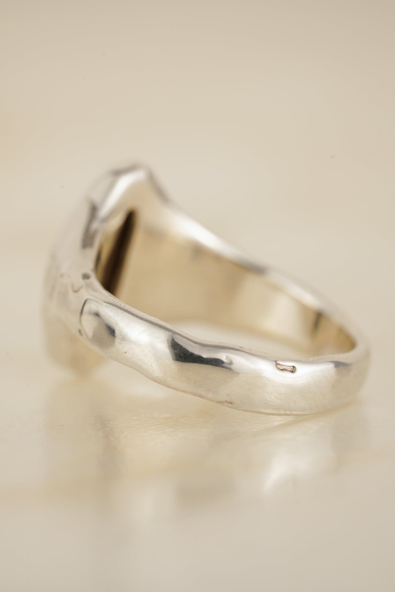 Bright blue boulder opal signet ring