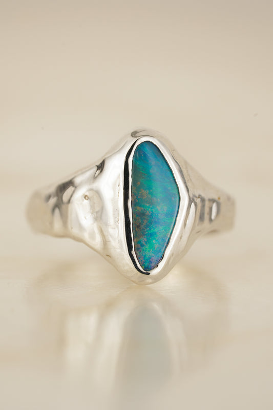 Bright blue boulder opal signet ring