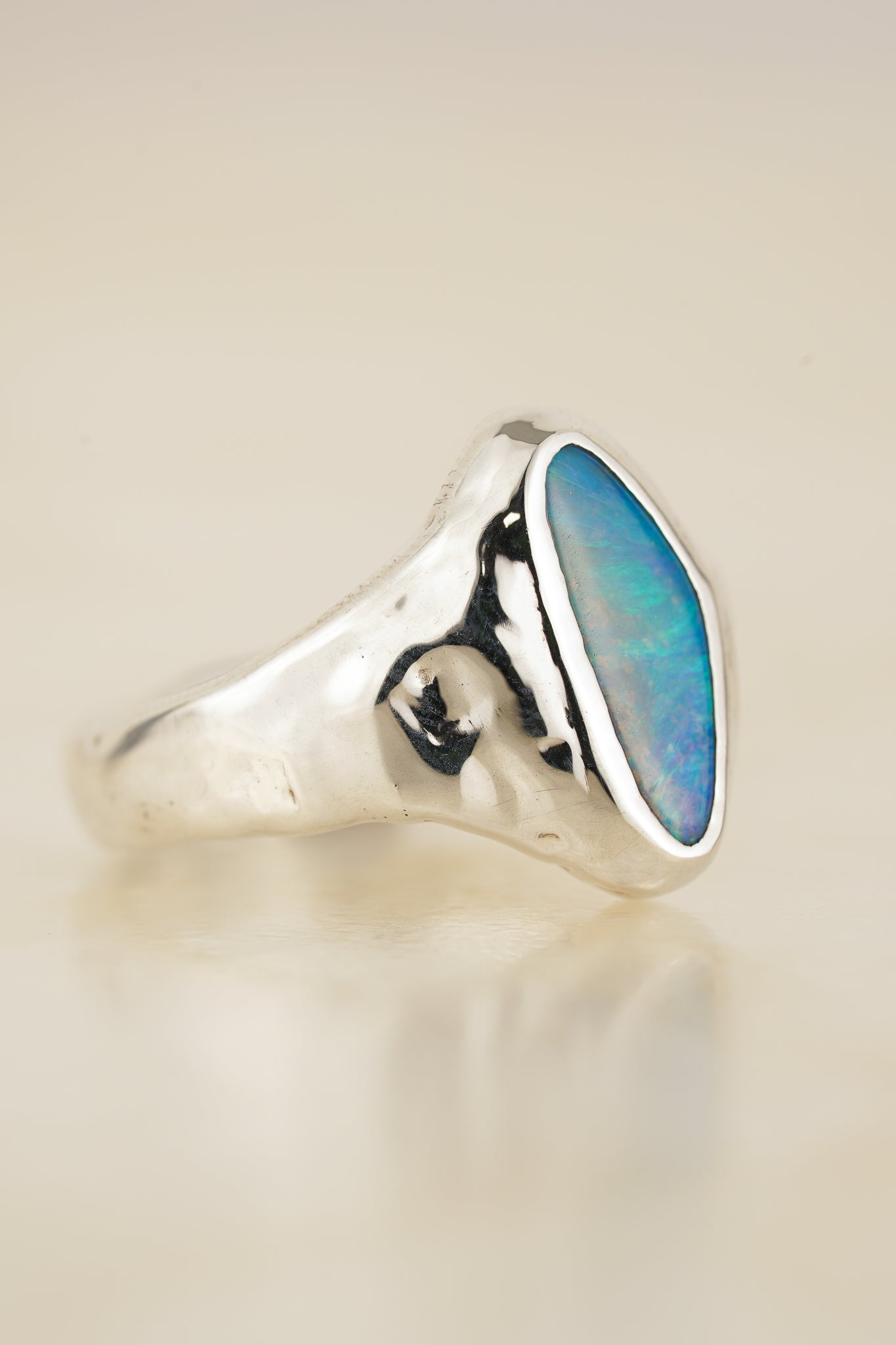 Bright blue boulder opal signet ring