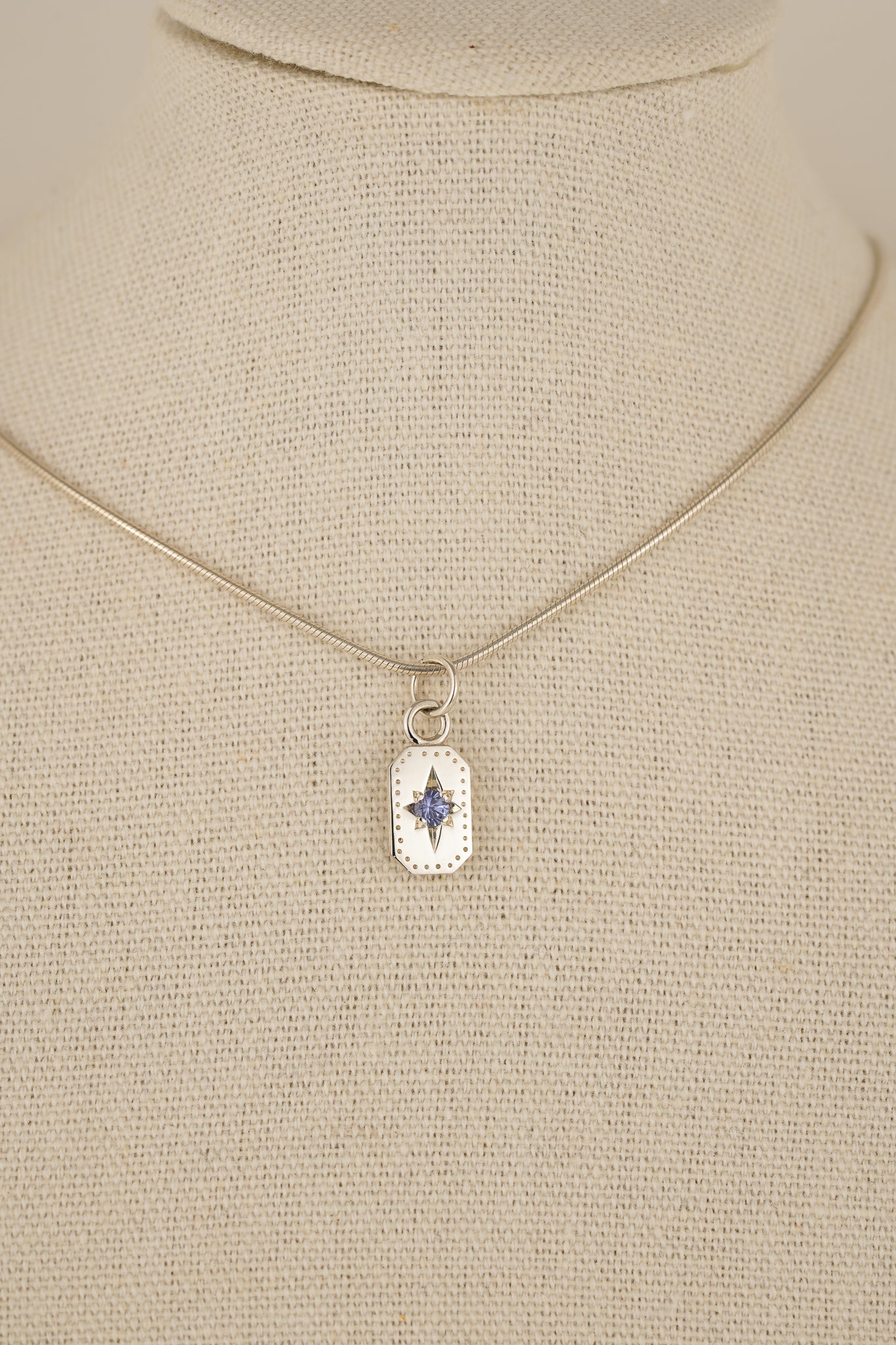 Emerald cut Ceylon sapphire pendant