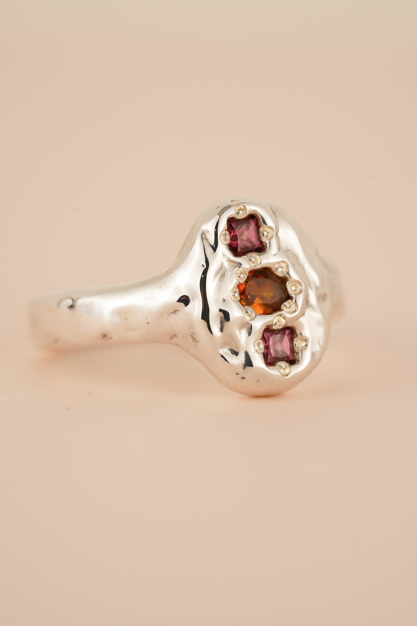 Molten signet with orange tourmaline & rhodolite garnet