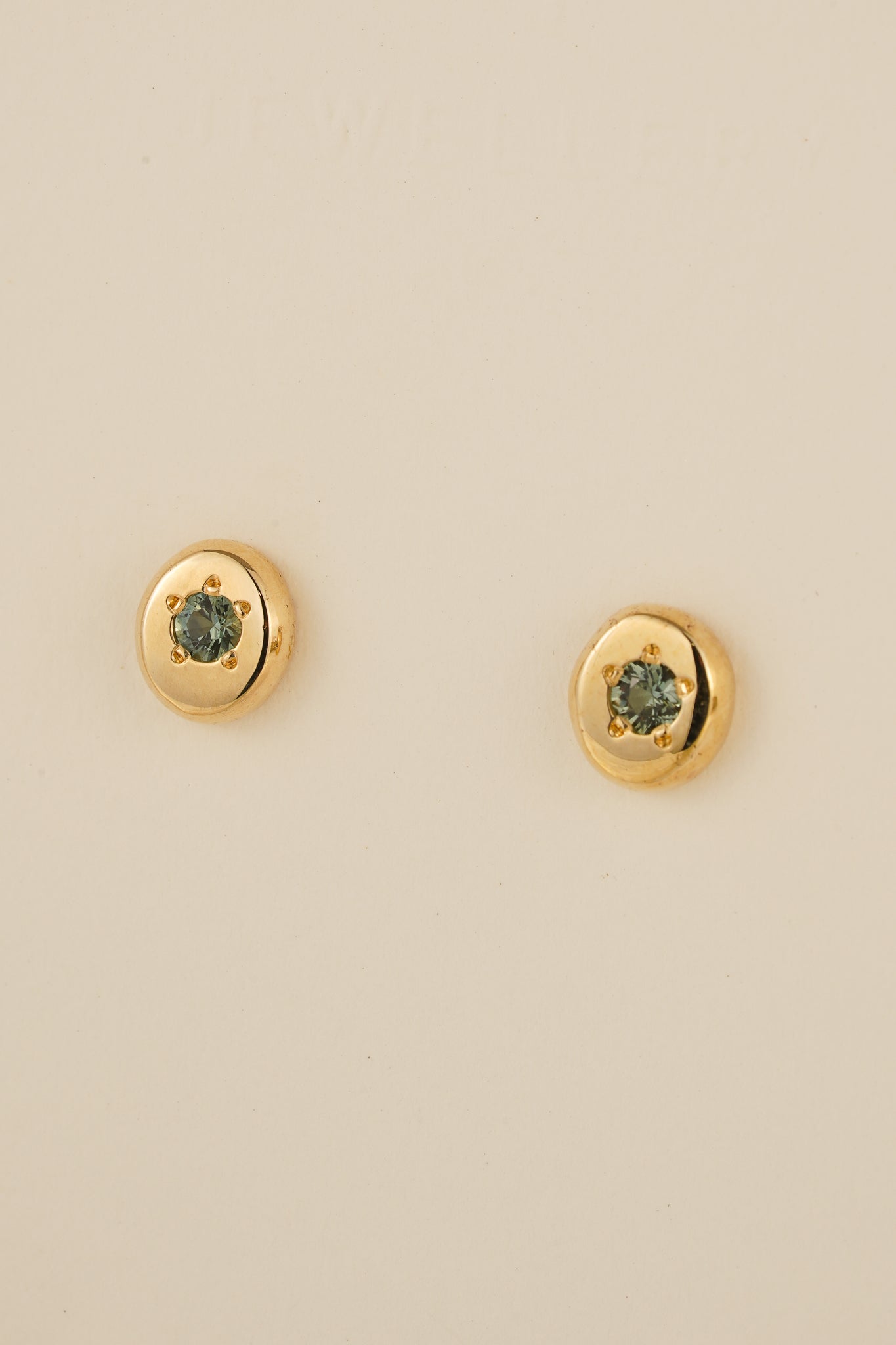 Solid gold teal Australian sapphire studs