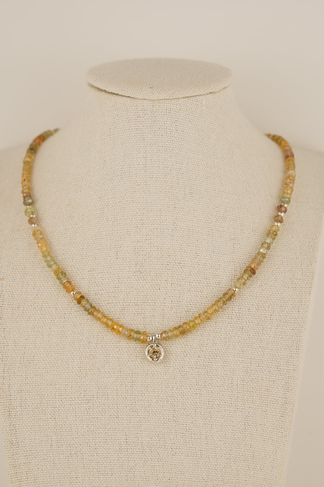 Mixed zircon beaded necklace with champagne zircon pendant - silver