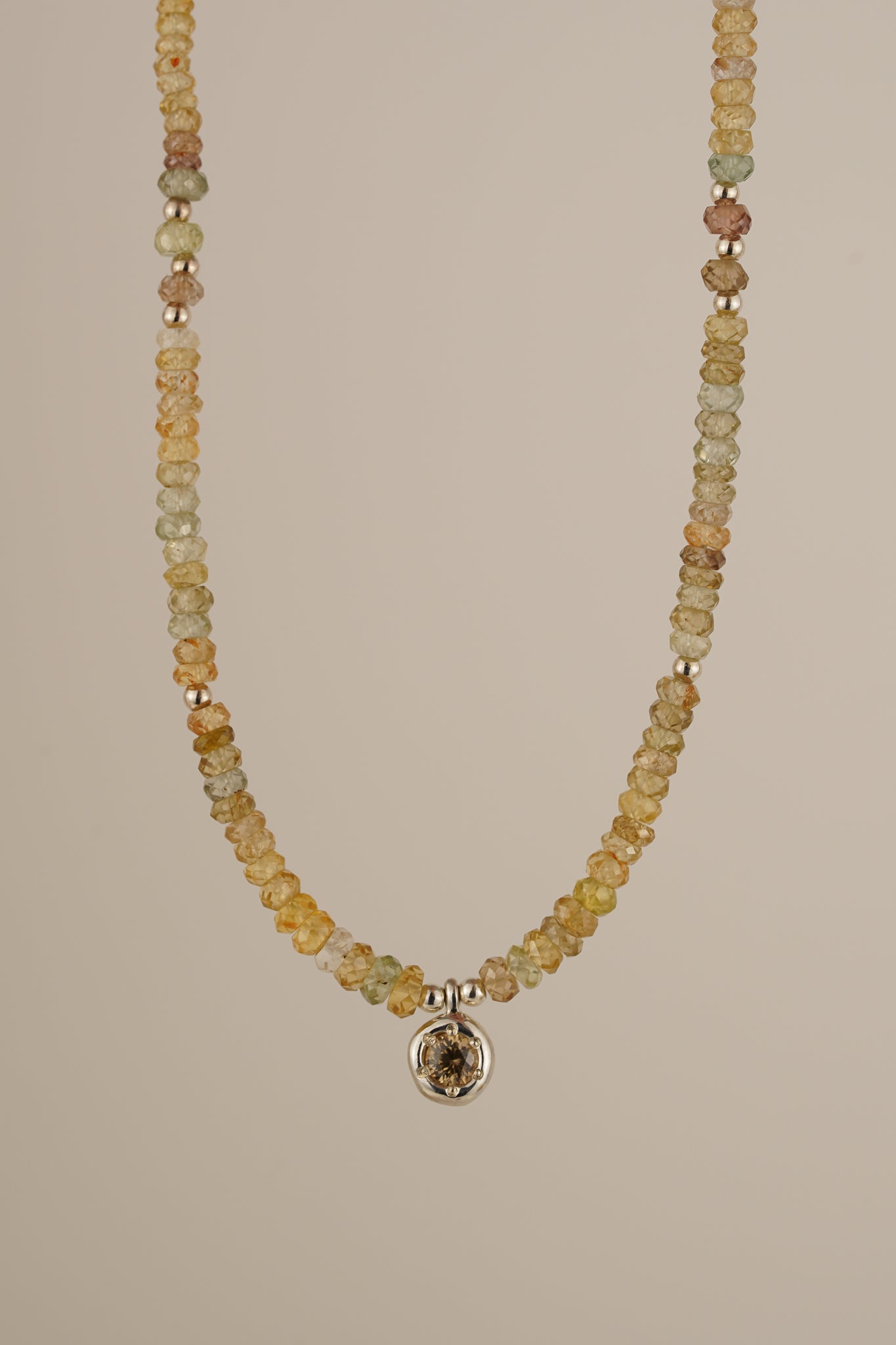 Mixed zircon beaded necklace with champagne zircon pendant - silver