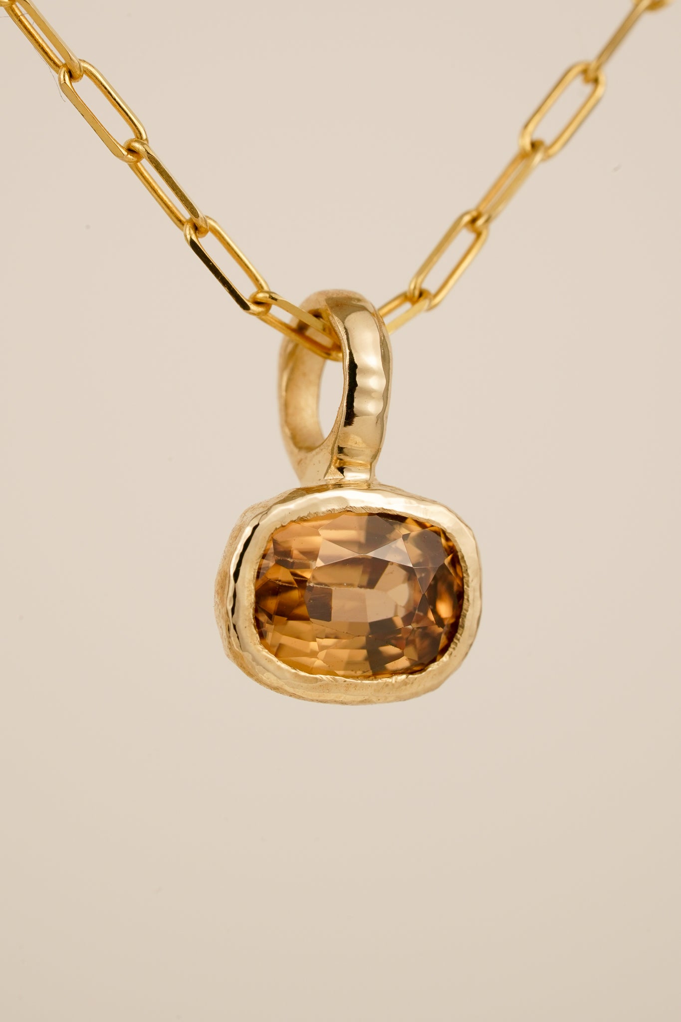 Solid gold whisky brown zircon pendant