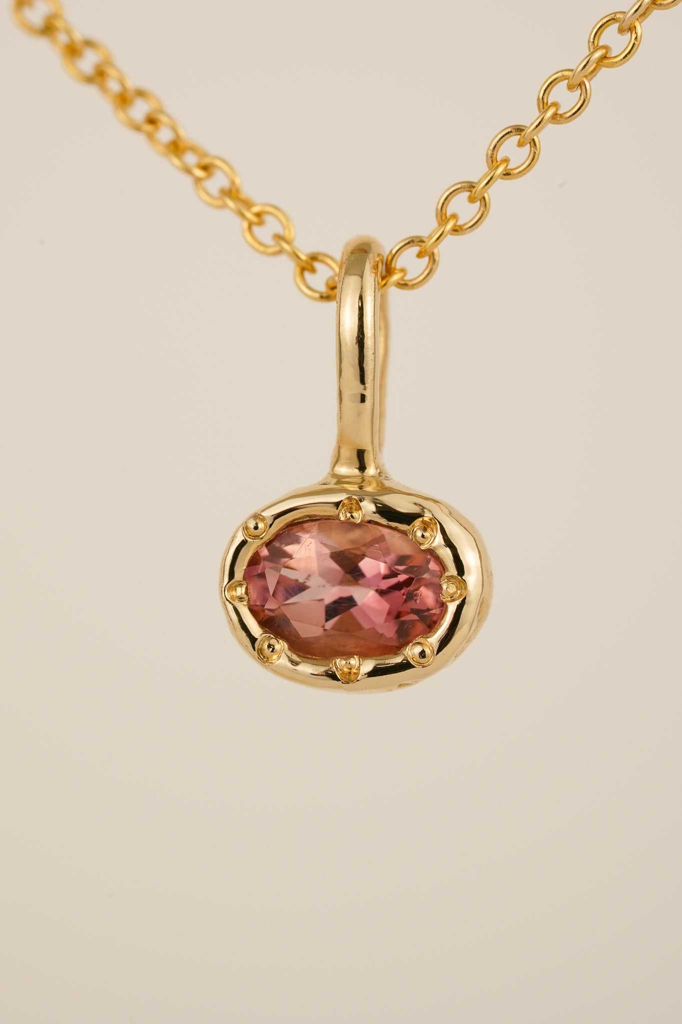 Solid gold pink tourmaline pendant