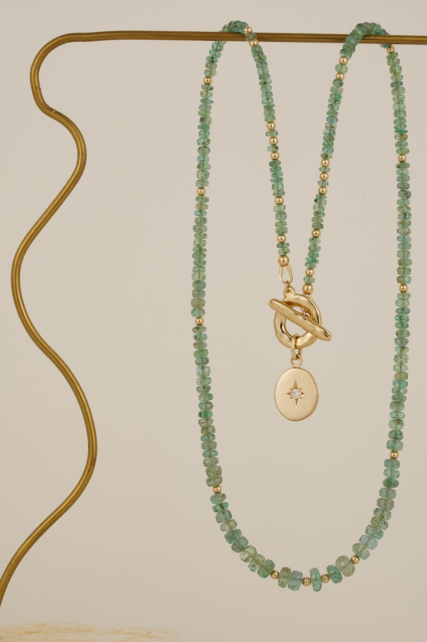 Emerald beaded necklace with solid gold toggle clasp & diamond pendant