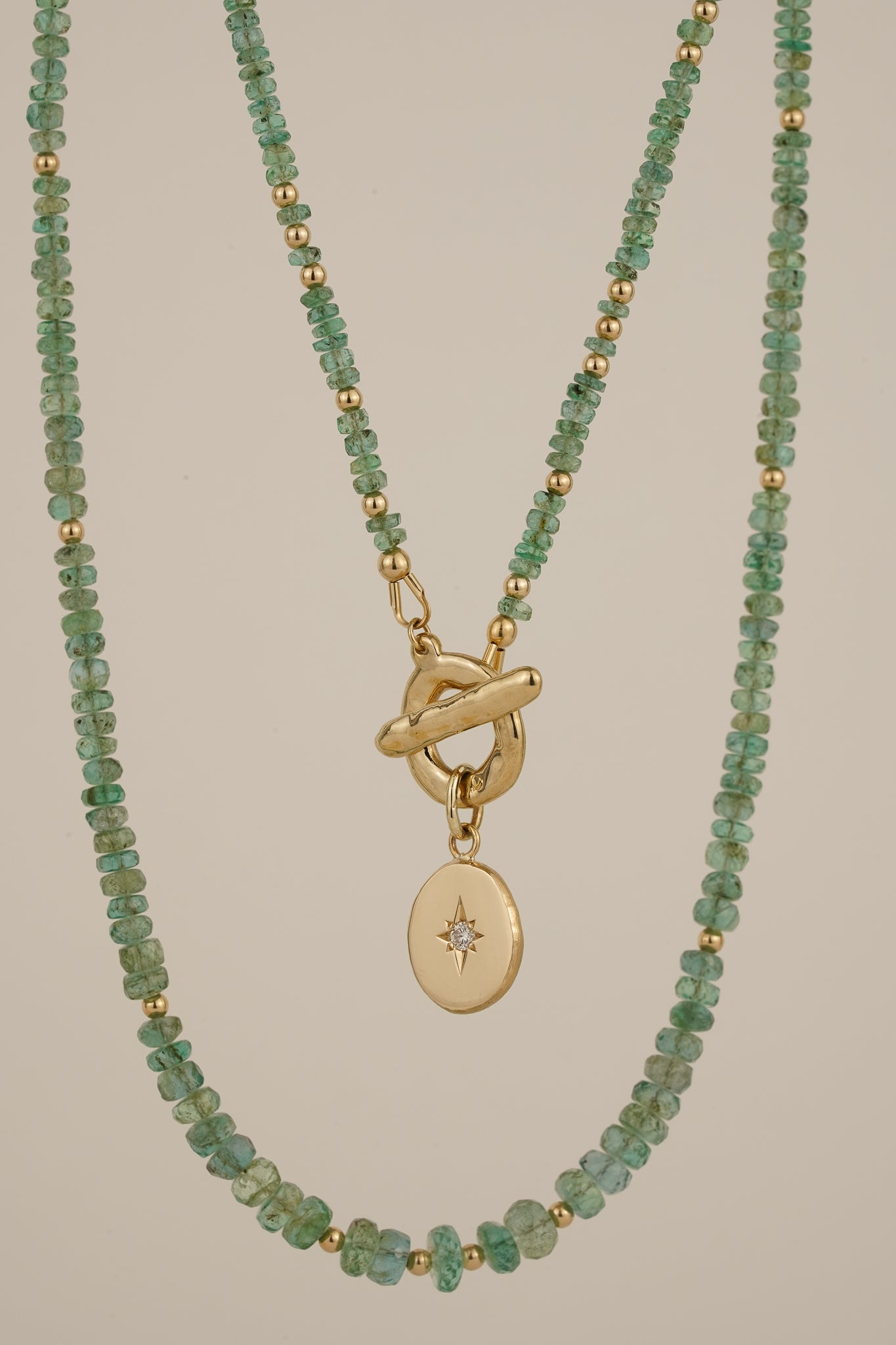 Emerald beaded necklace with solid gold toggle clasp & diamond pendant