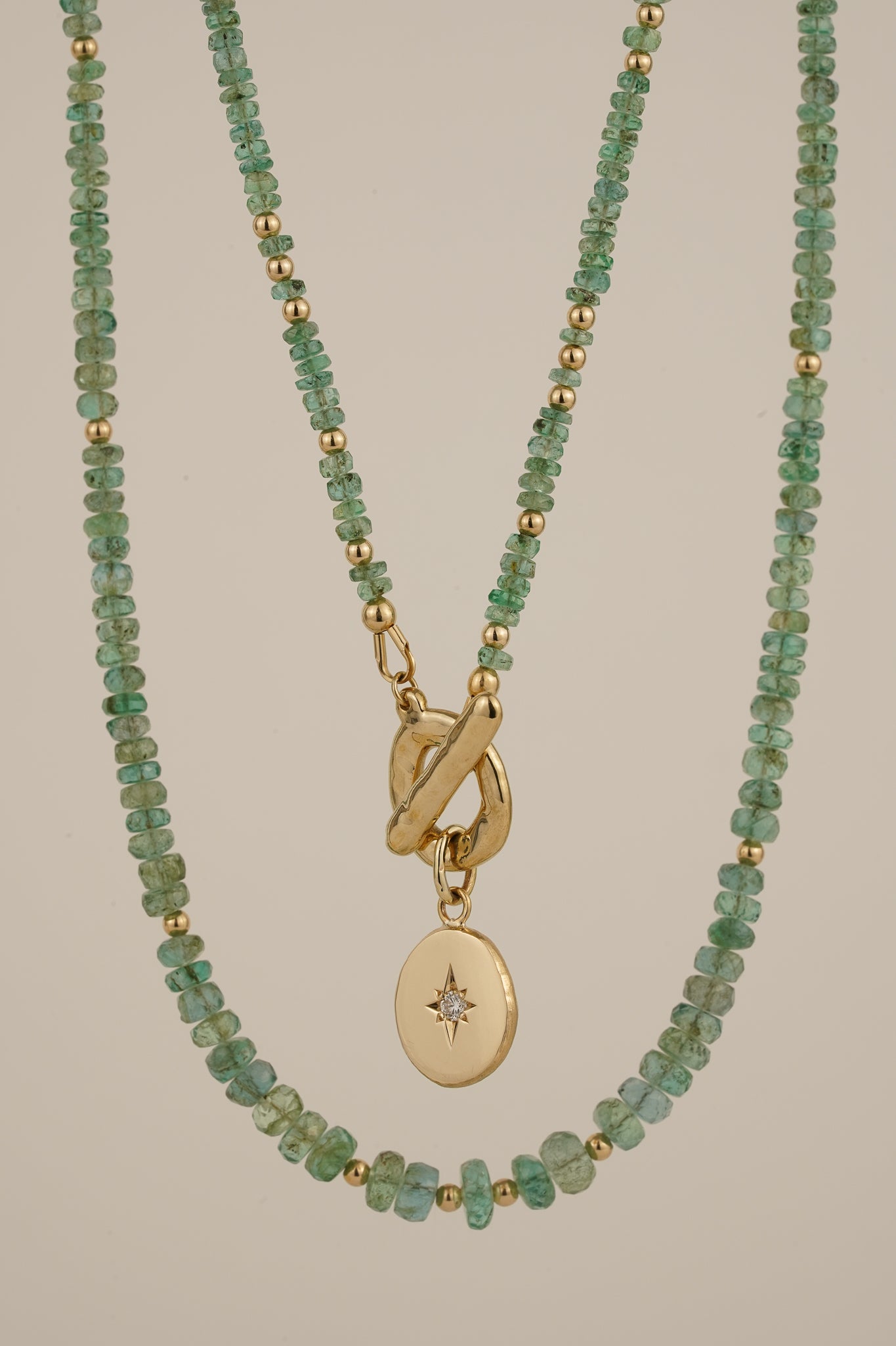Emerald beaded necklace with solid gold toggle clasp & diamond pendant