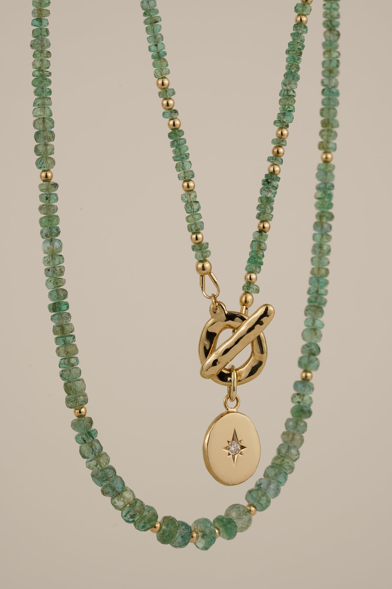 Emerald beaded necklace with solid gold toggle clasp & diamond pendant