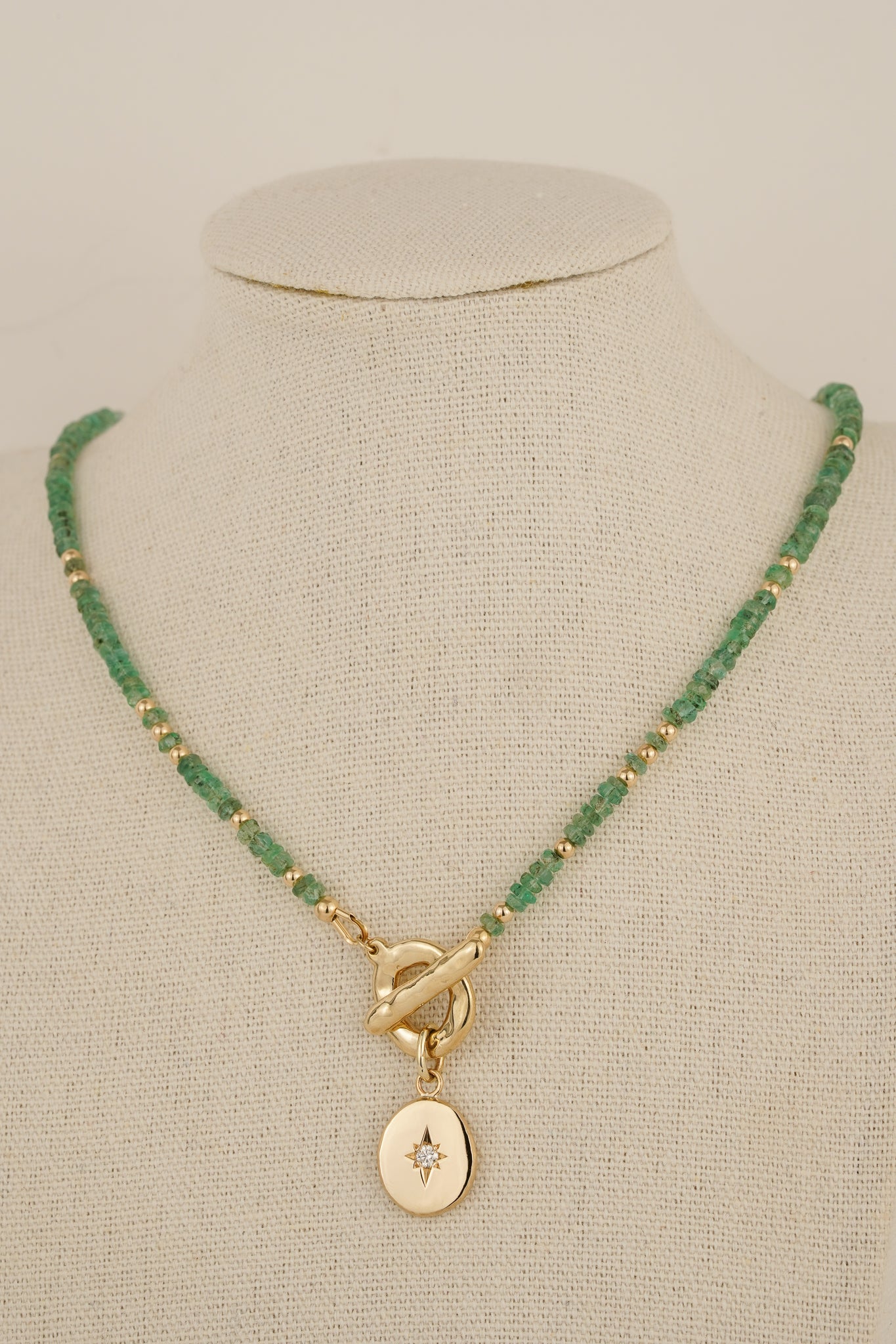 Emerald beaded necklace with solid gold toggle clasp & diamond pendant