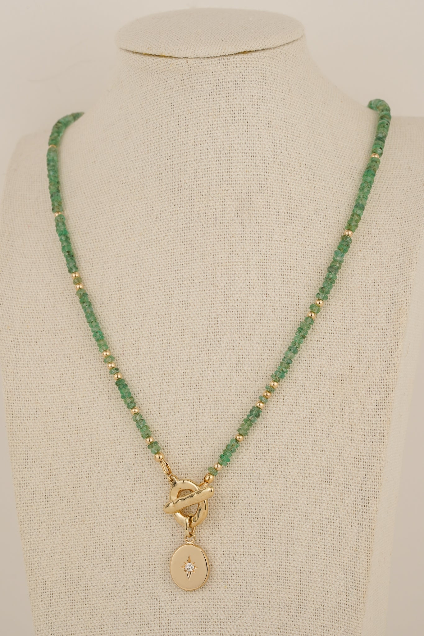 Emerald beaded necklace with solid gold toggle clasp & diamond pendant