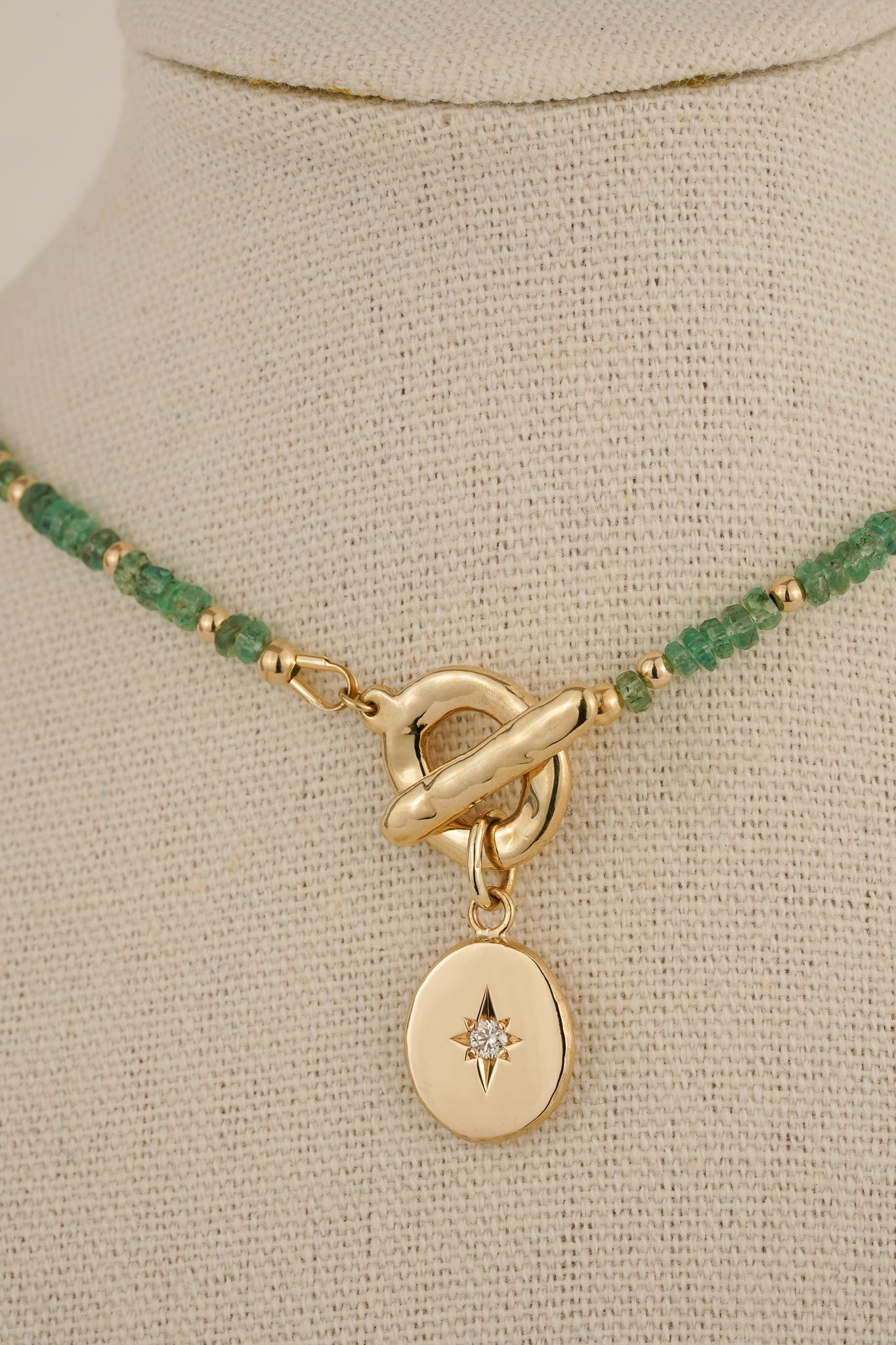 Emerald beaded necklace with solid gold toggle clasp & diamond pendant