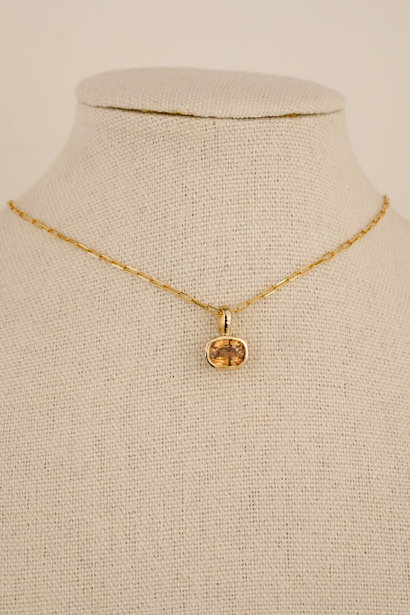 Solid gold whisky brown zircon pendant