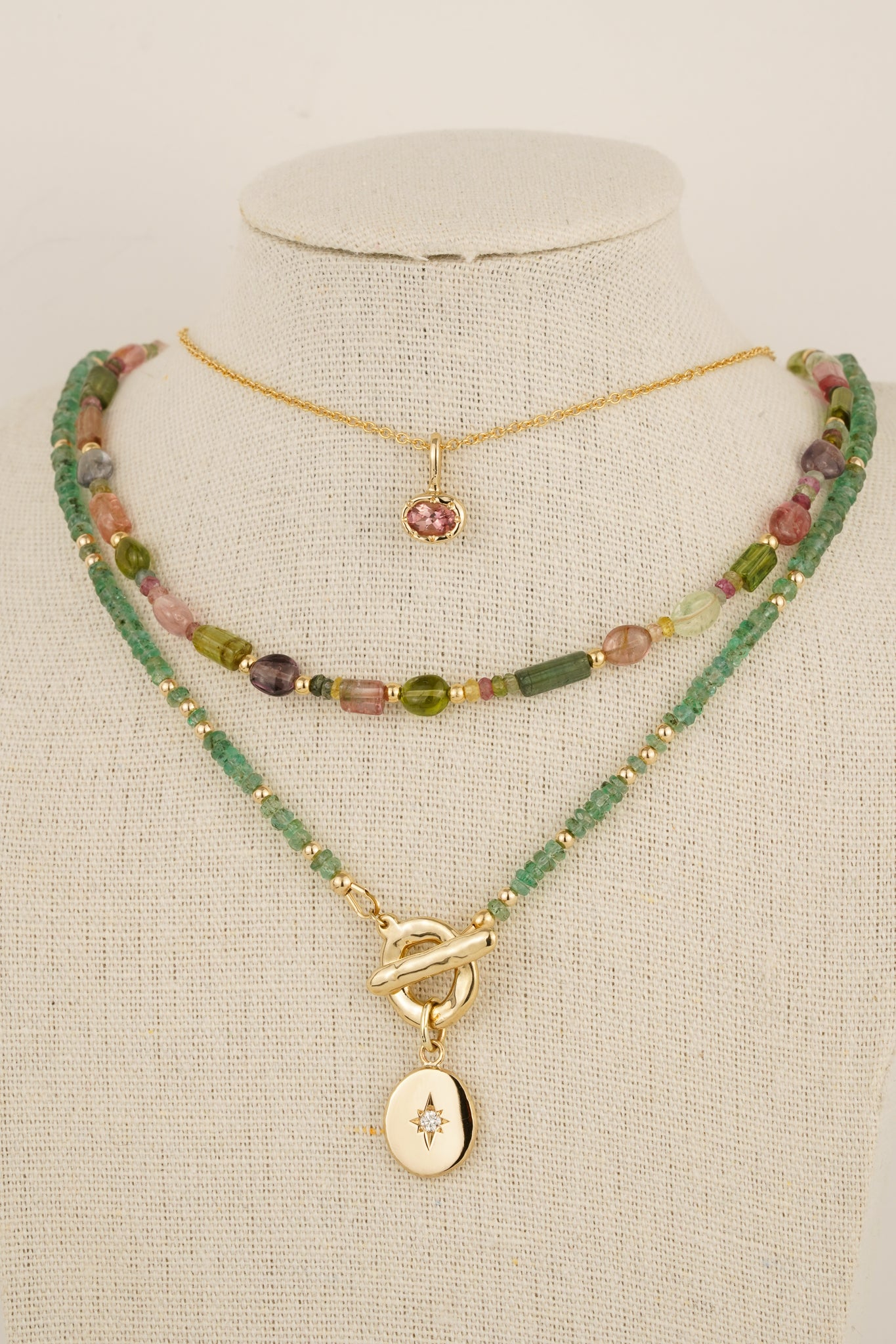 Solid gold pink tourmaline pendant