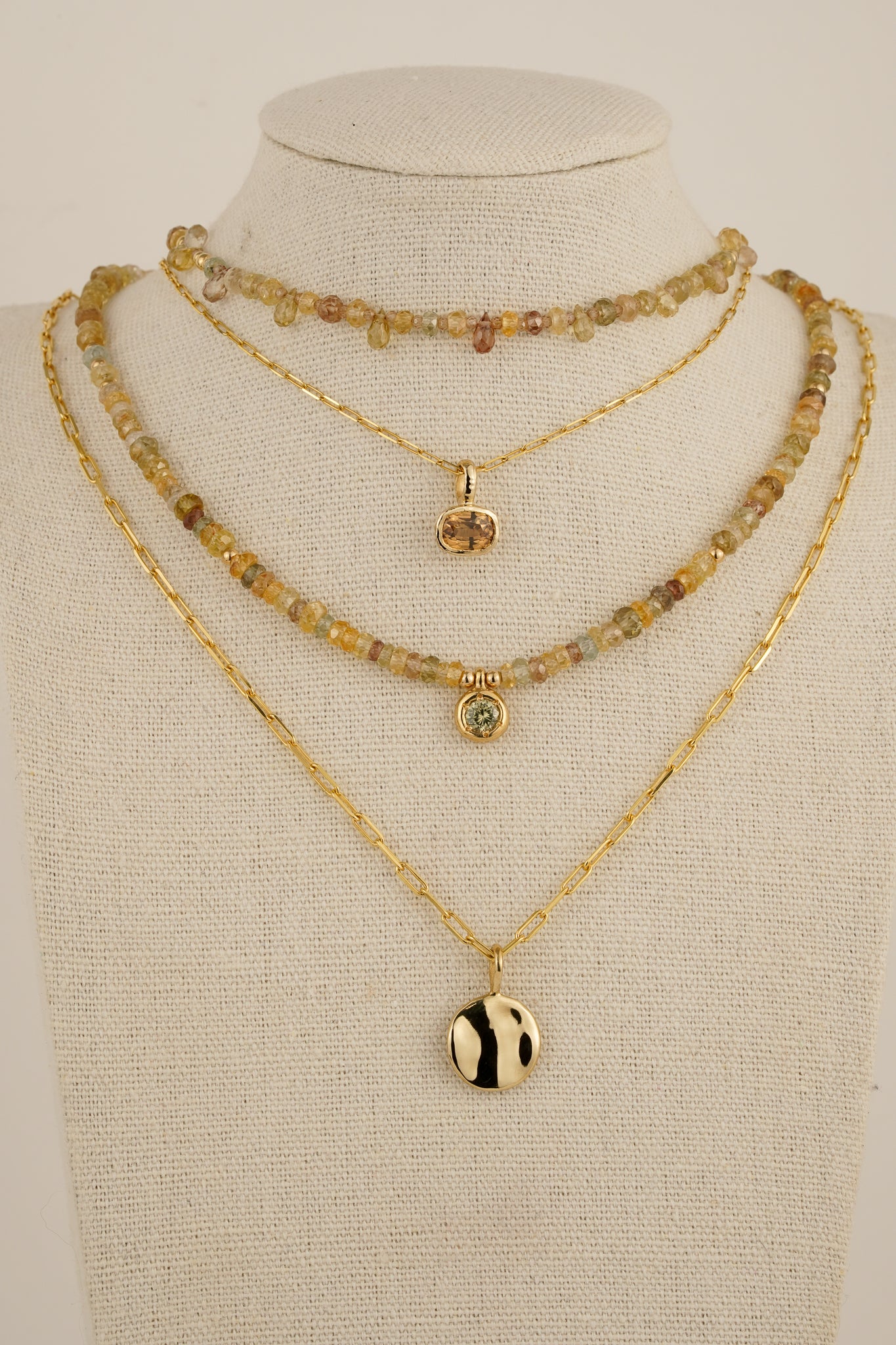 Solid gold whisky brown zircon pendant