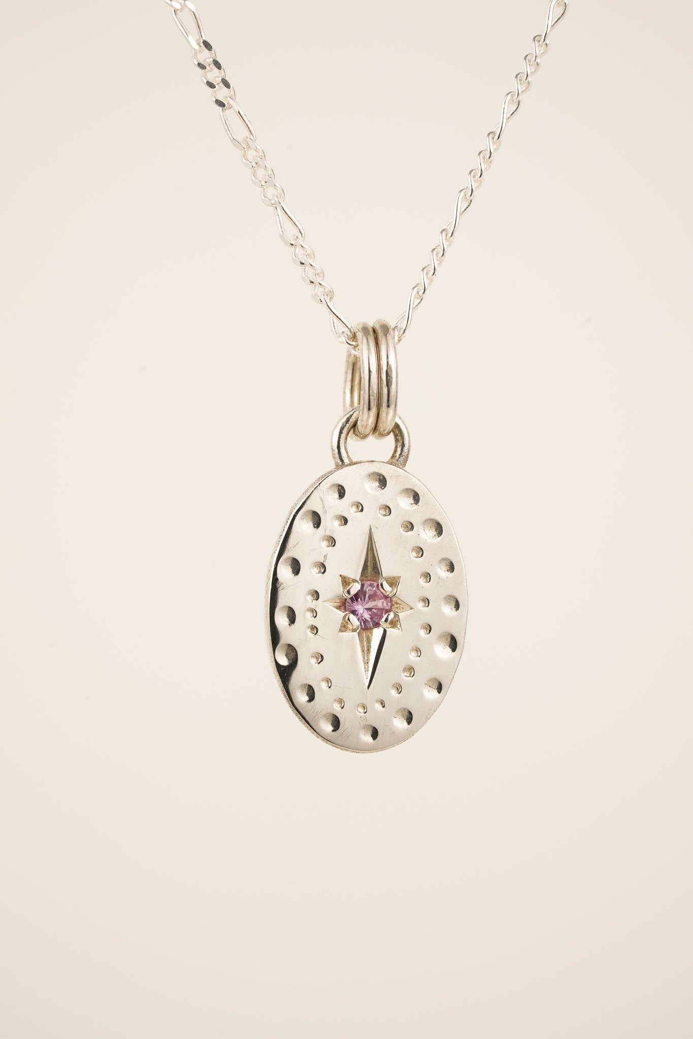 Classic oval pendant with pink sapphire