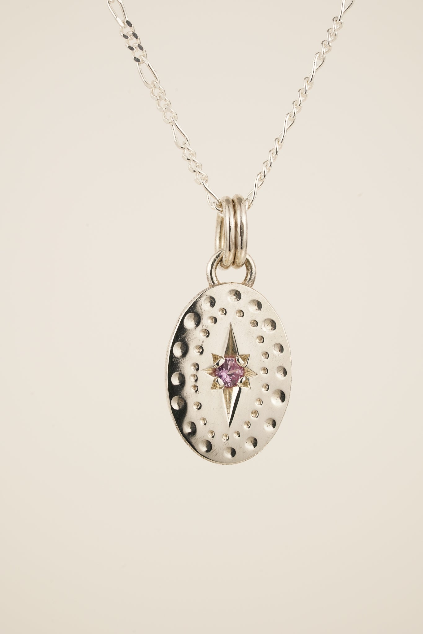 Classic oval pendant with pink sapphire