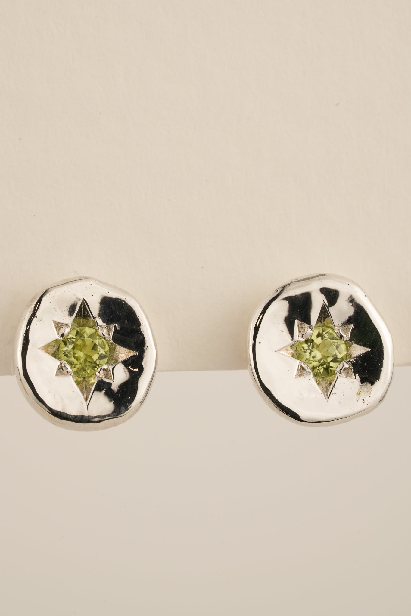 Molten peridot studs
