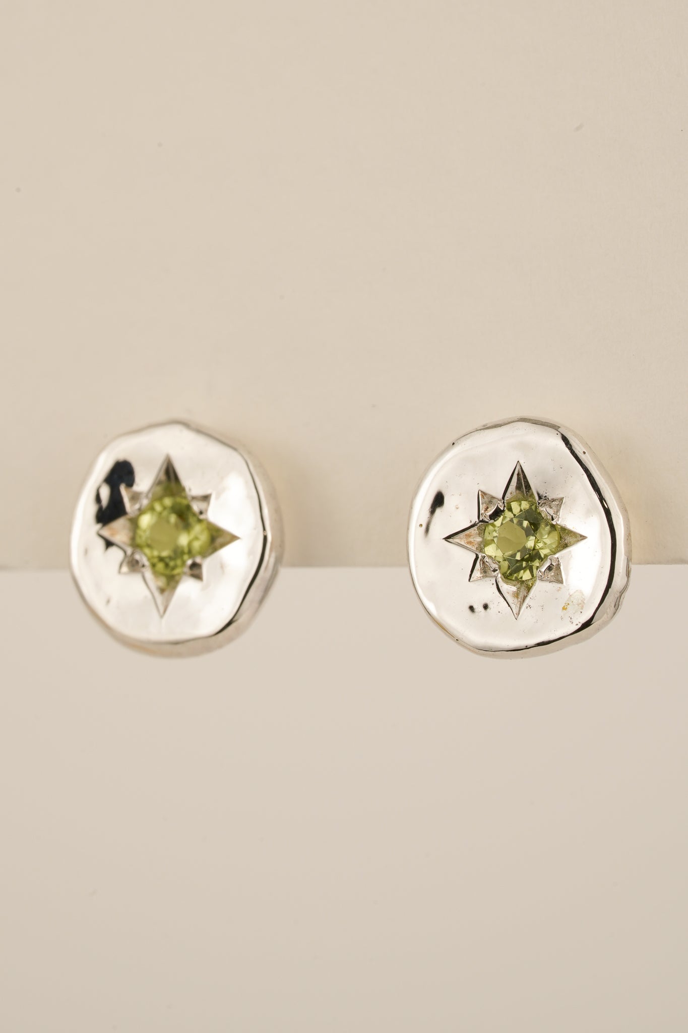 Molten peridot studs