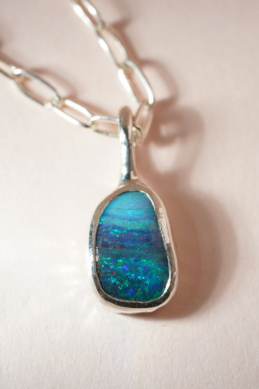 Deep blue boulder opal pendant