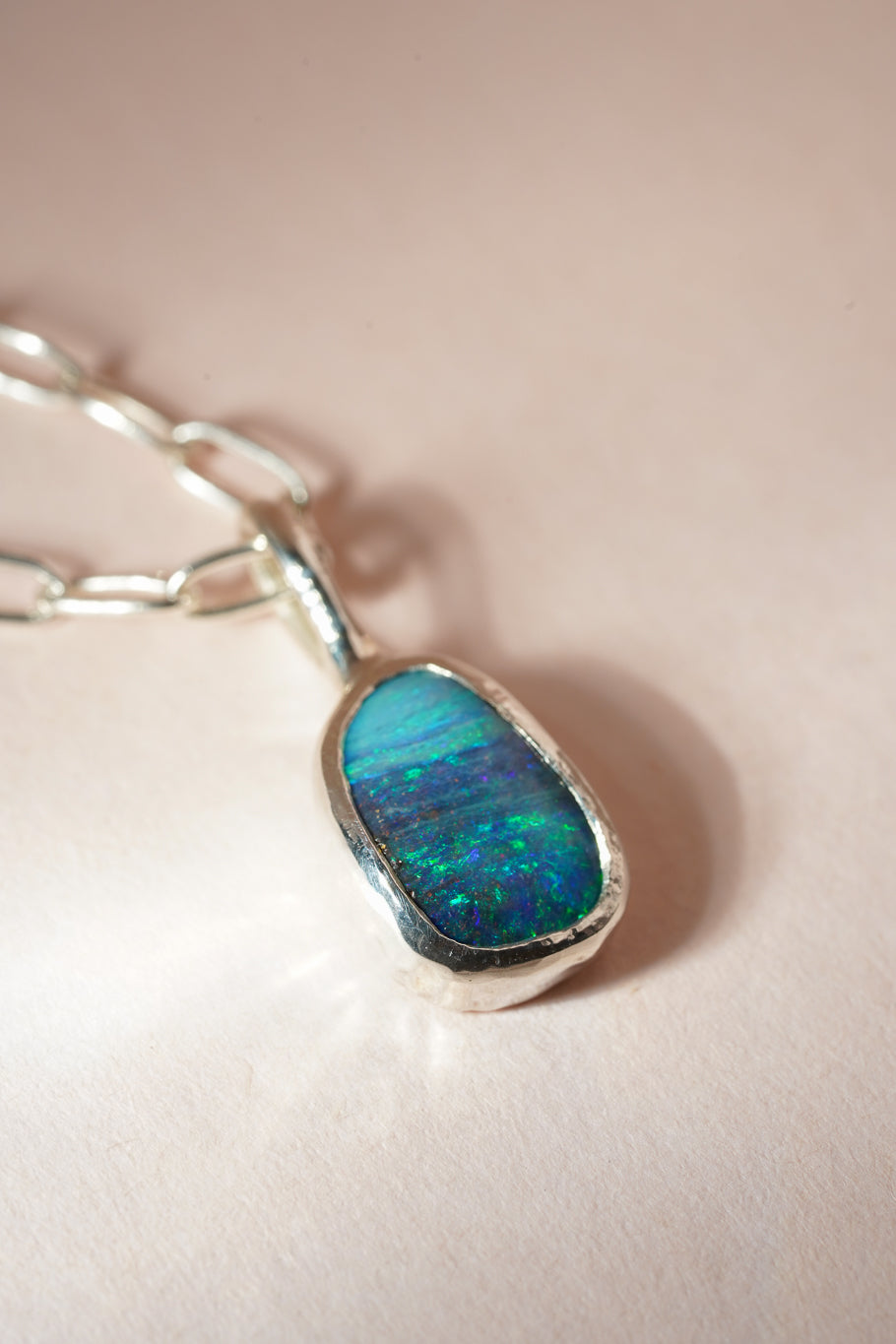 Deep blue boulder opal pendant