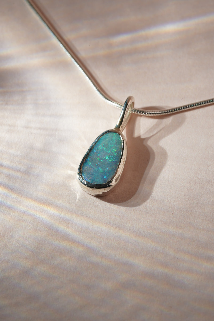 Blue boulder opal pendant