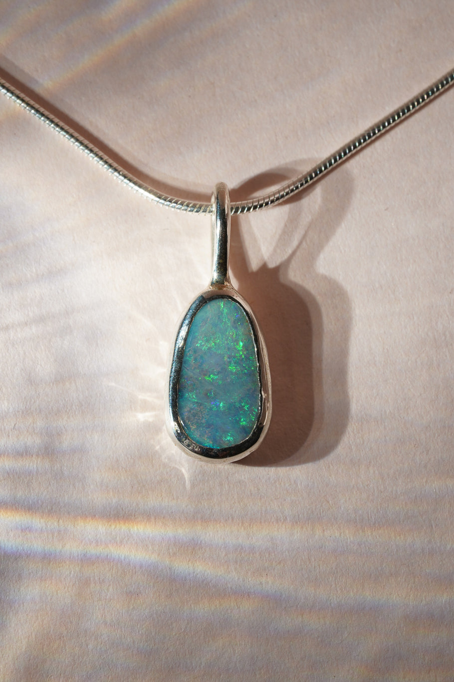 Blue boulder opal pendant