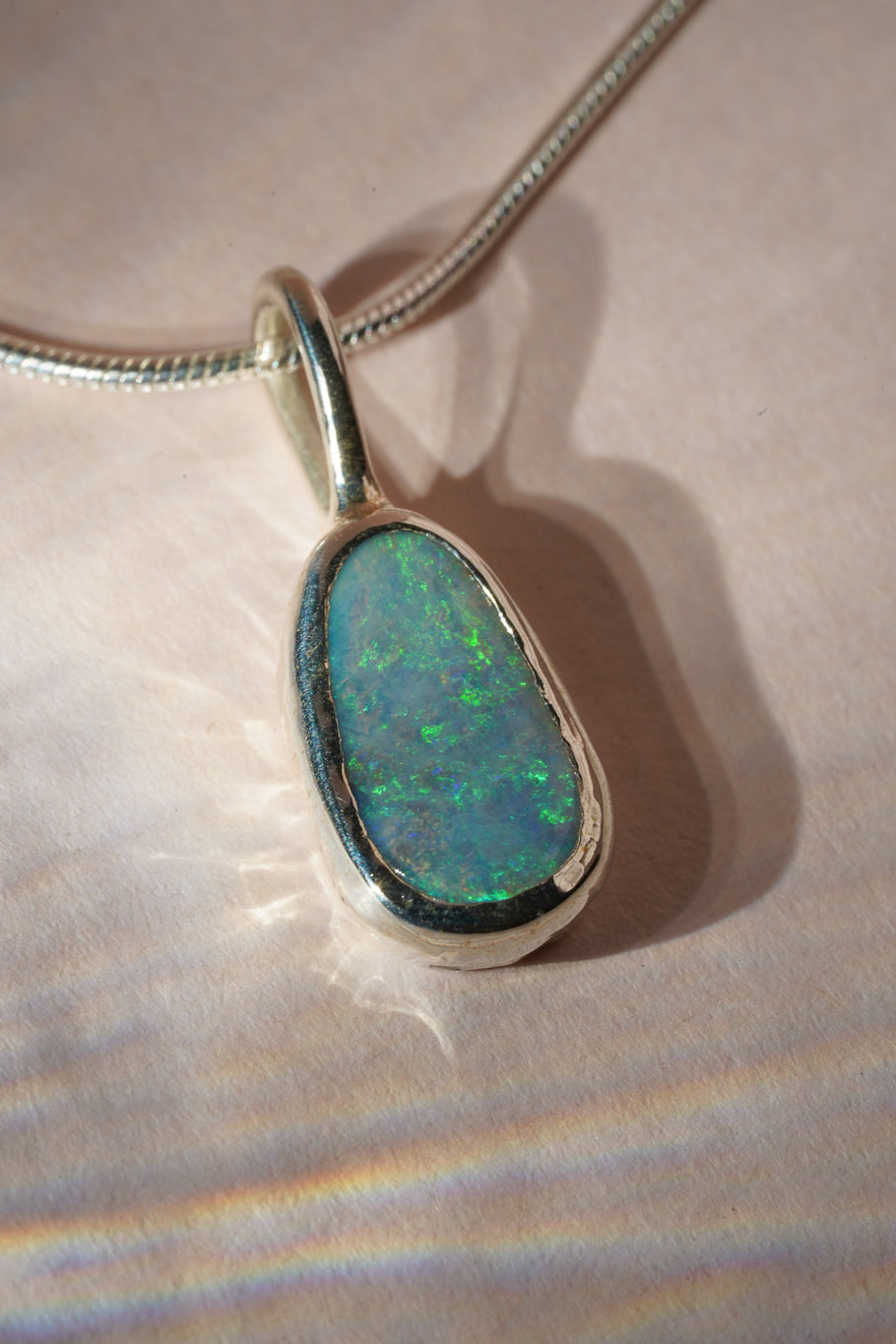 Blue boulder opal pendant