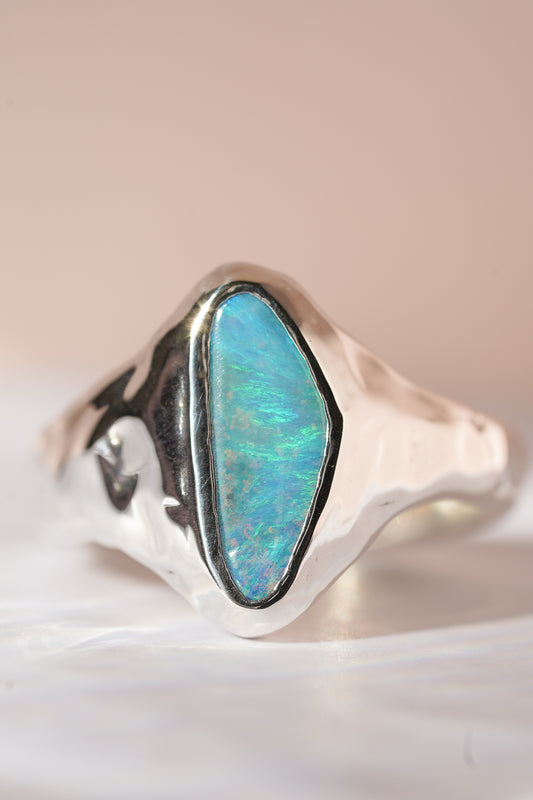 Bright blue boulder opal signet ring