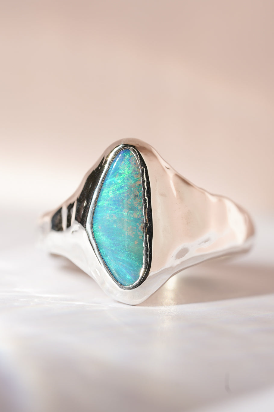 Bright blue boulder opal signet ring